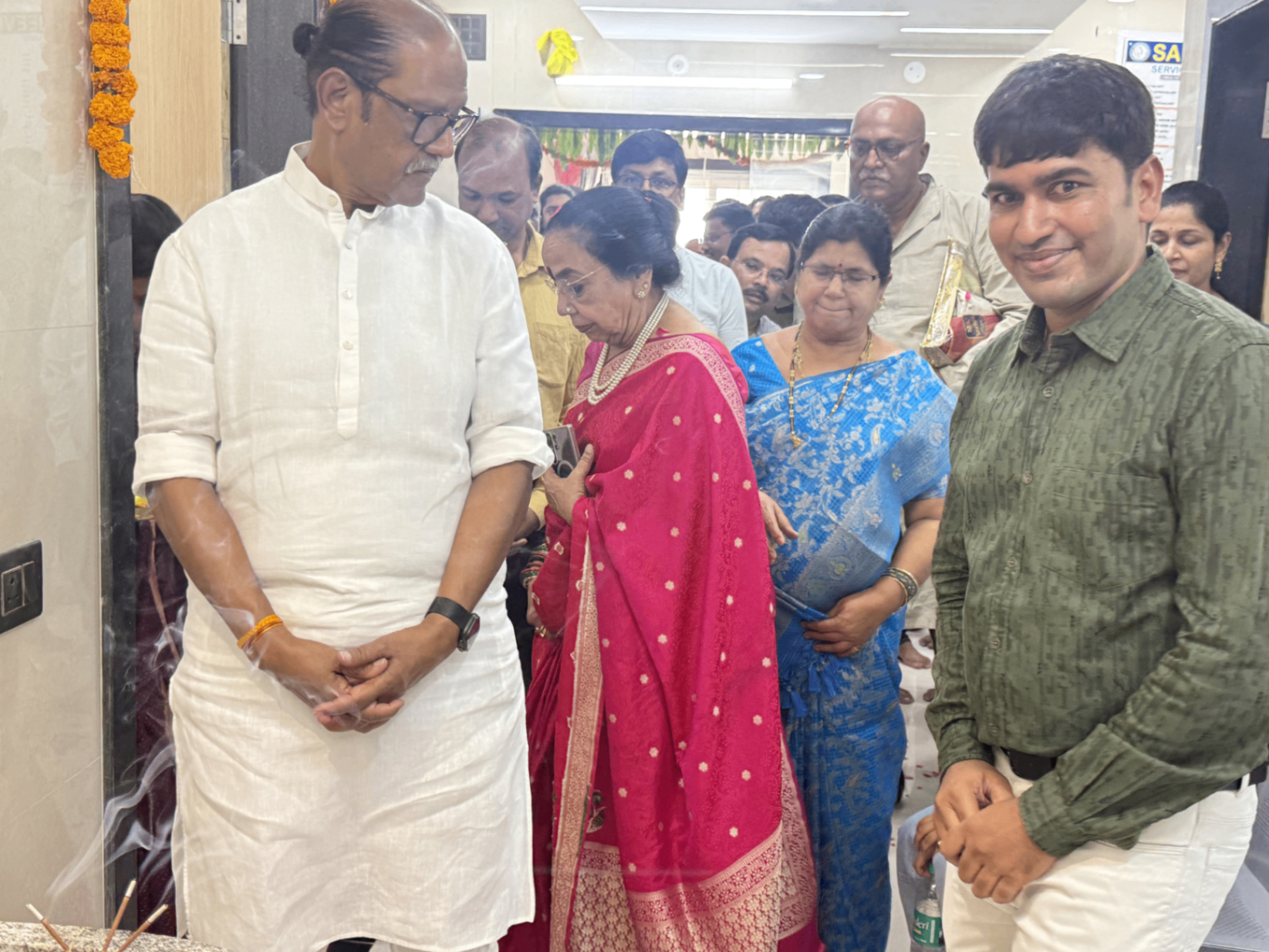 Guests entering the decorated hospital corridor during the event.